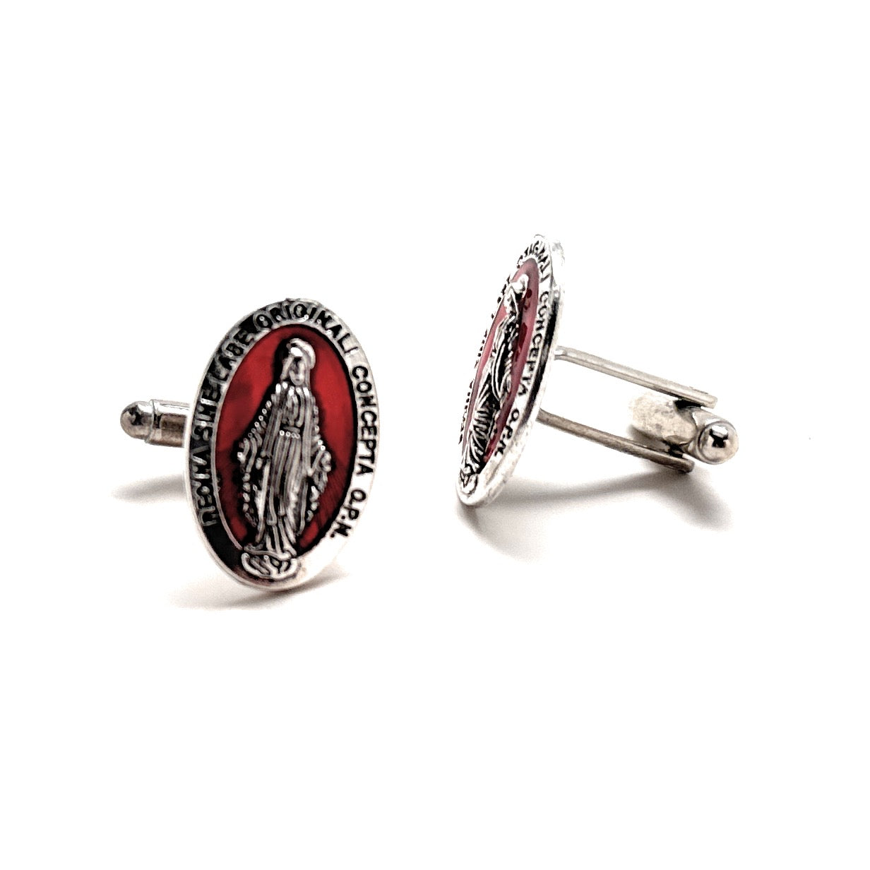 Cufflinks with religious design on a white background