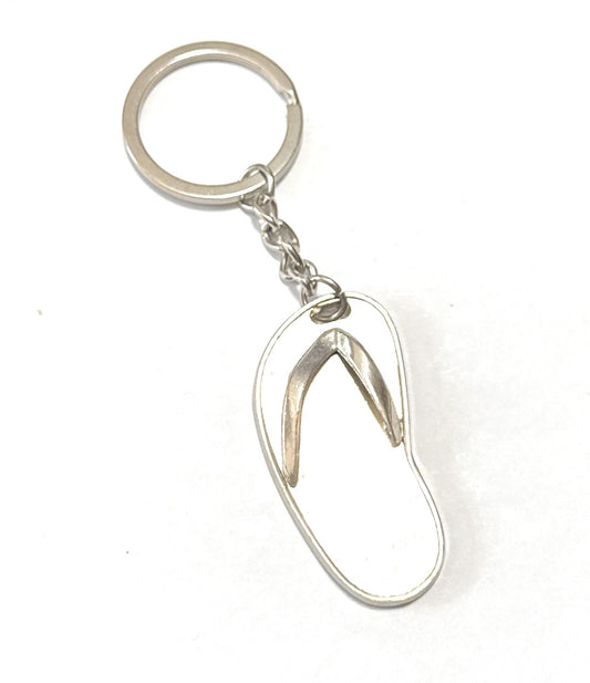 Silver flip-flop keychain on a white background