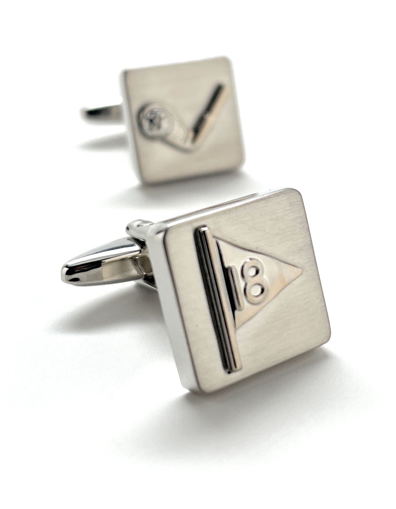 Silver cufflinks with a triangle design and number '18' on a white background