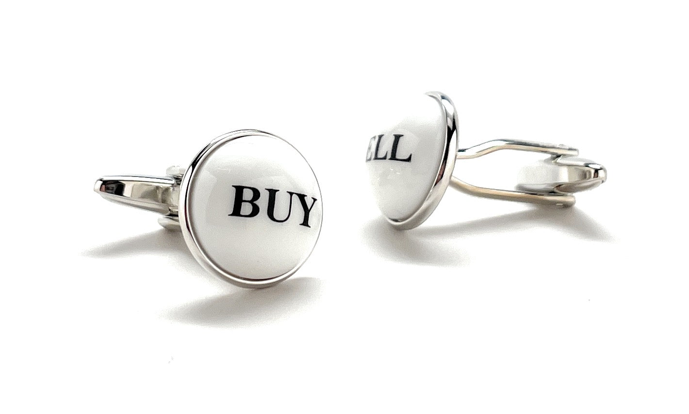 Silver cufflinks with 'BUY' and 'SELL' text on a white background