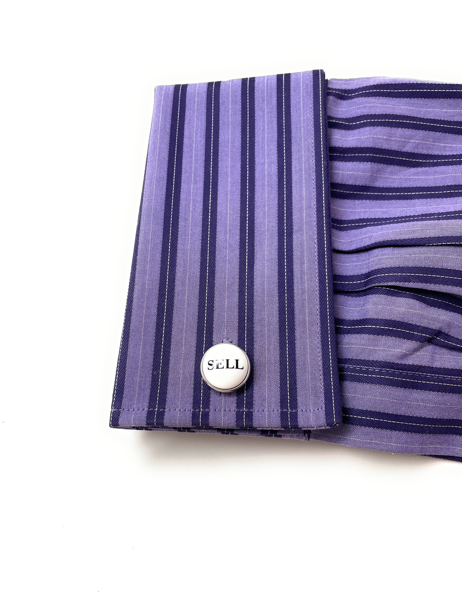 Purple striped shirt with cufflinks on a white background