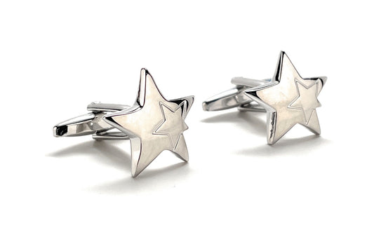 Star-shaped silver cufflinks on a white background