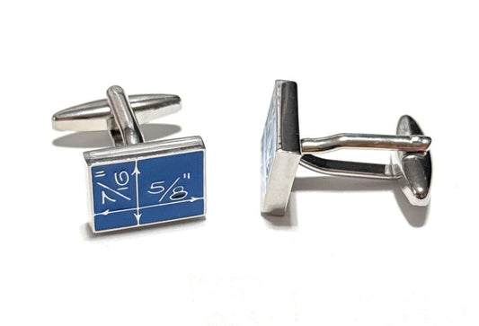 Cufflinks with blue design on a white background
