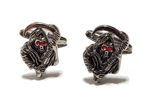 Silver Grim Reaper cufflinks on a white background