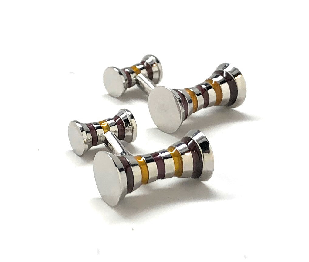 Set of silver cufflinks with multicolored stripes on a white background