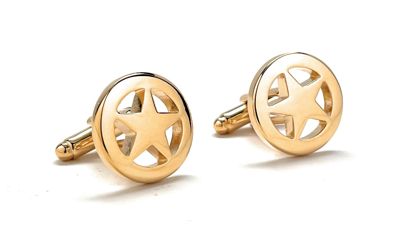 Gold star-shaped cufflinks on a white background