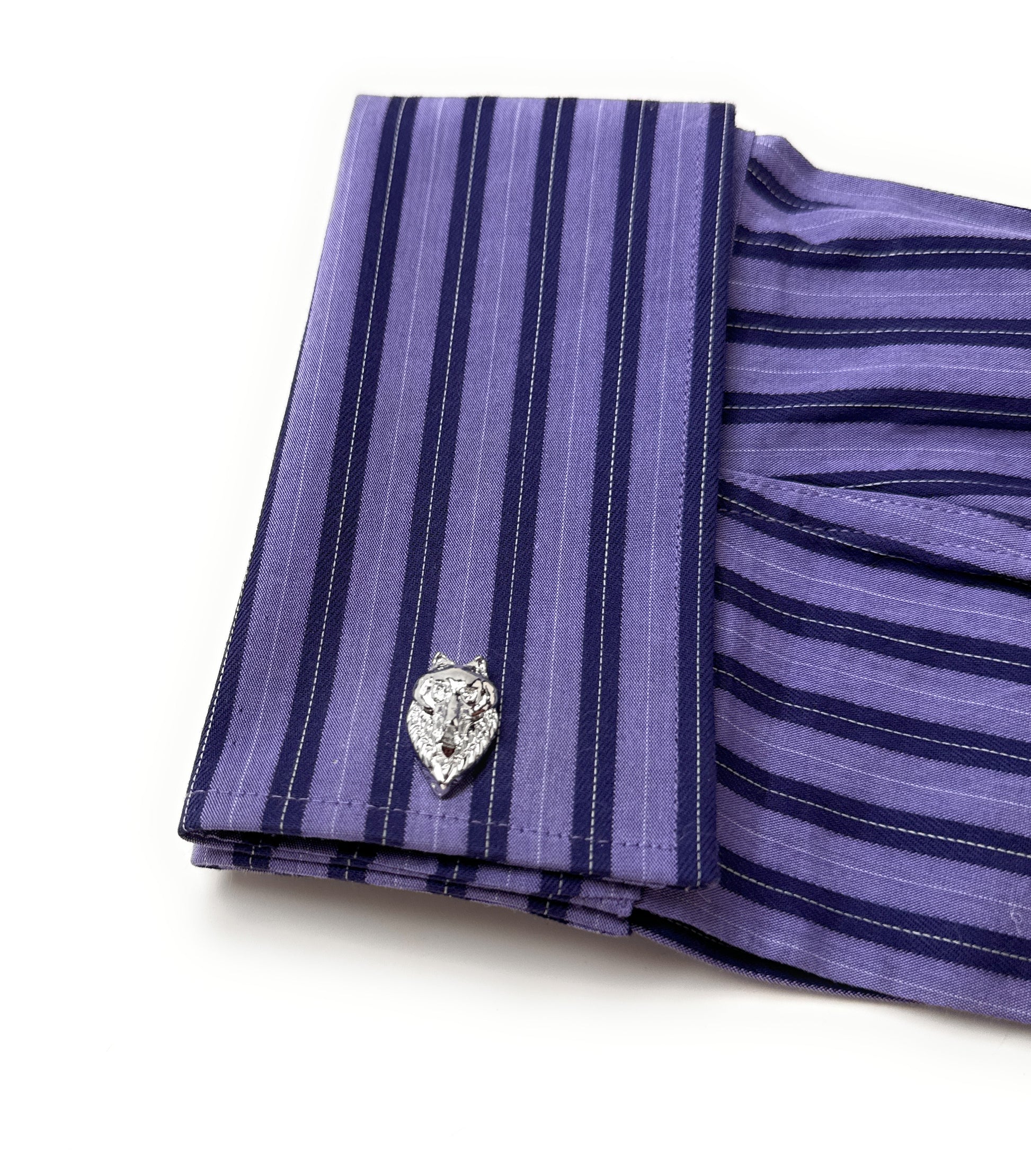 Purple striped shirt with a decorative button on a white background