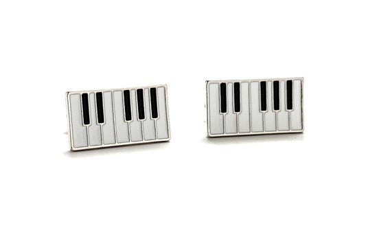 Piano key design cufflinks on a white background