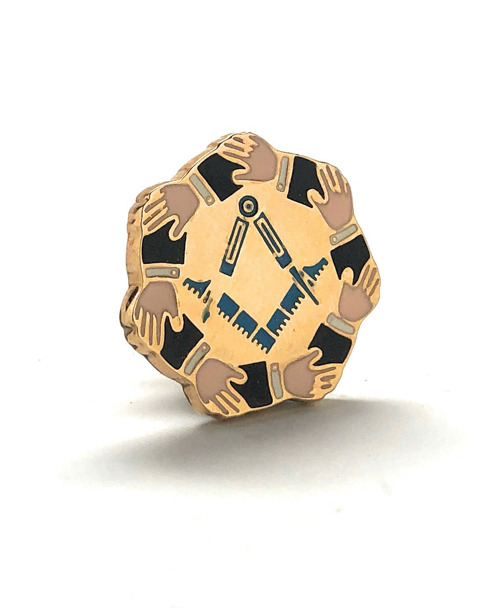 Gold badge with black and brown hands design on a white background