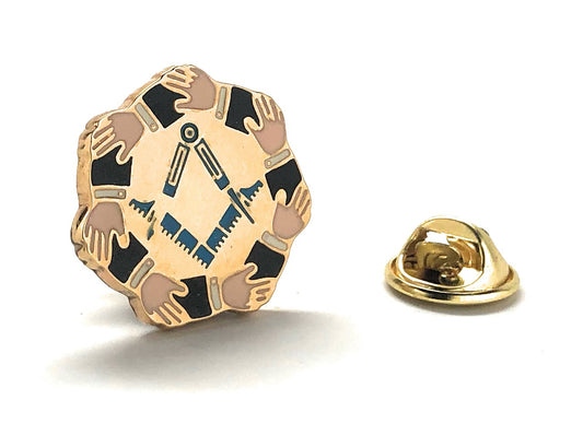 Gold lapel pin with diverse hands design on a white background