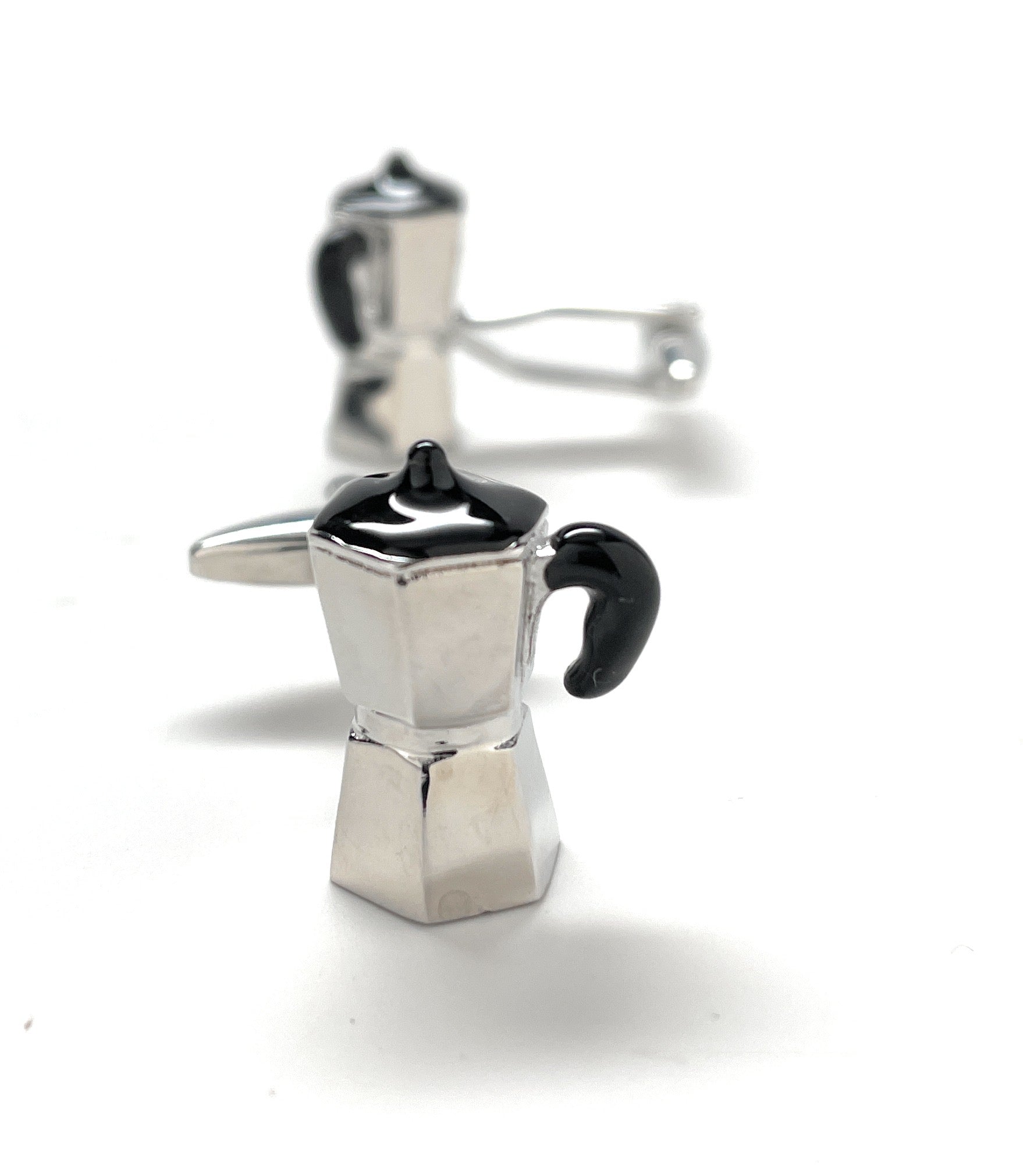 up close coffee pot cufflinks white back ground