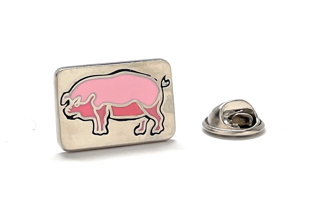 Pin with pink pig design on a white background