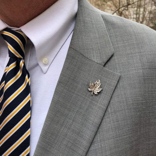 Polished silver maple leaf pin with butterfly backing