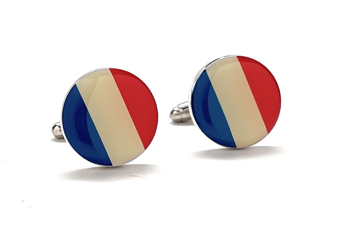 Round France flag cufflinks with glossy blue, white, and red enamel design and silver bullet-back closure.
