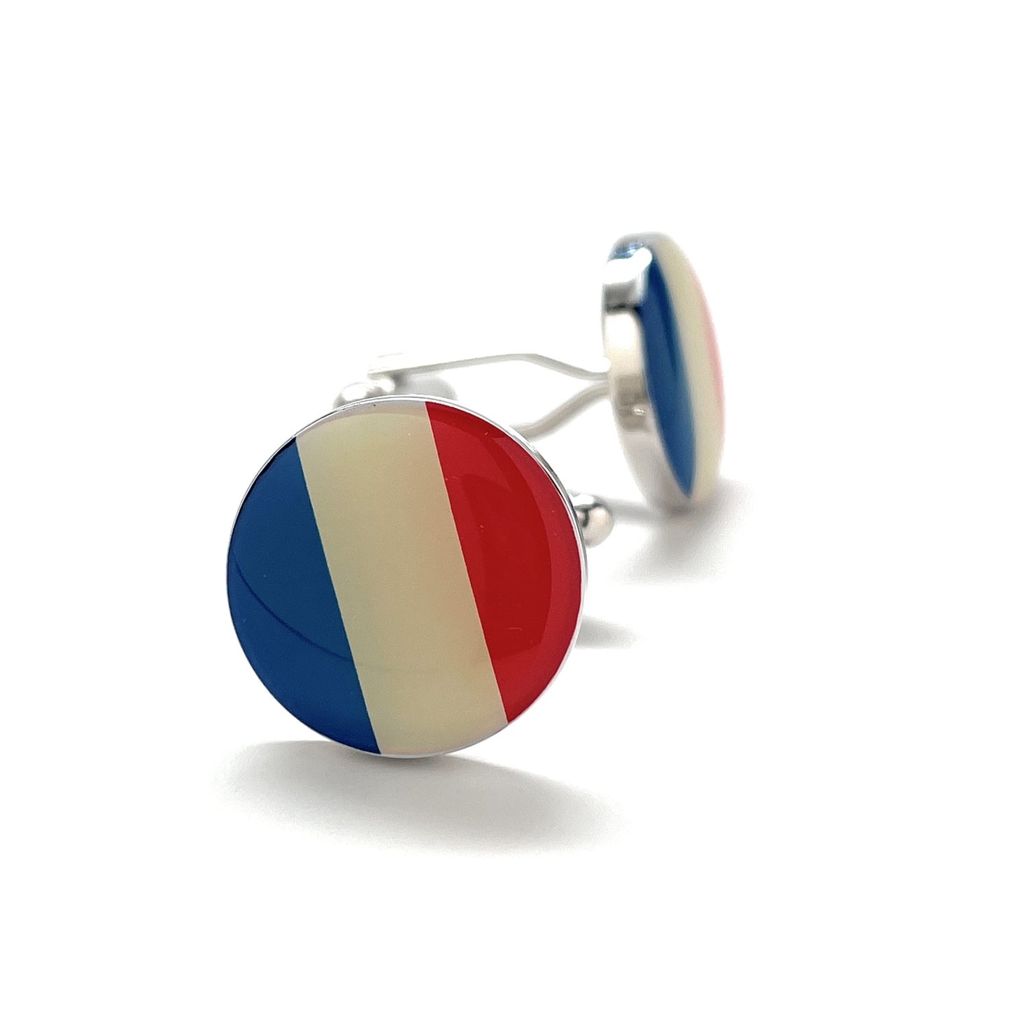 Round France flag cufflinks with glossy blue, white, and red enamel design and silver bullet-back closure.