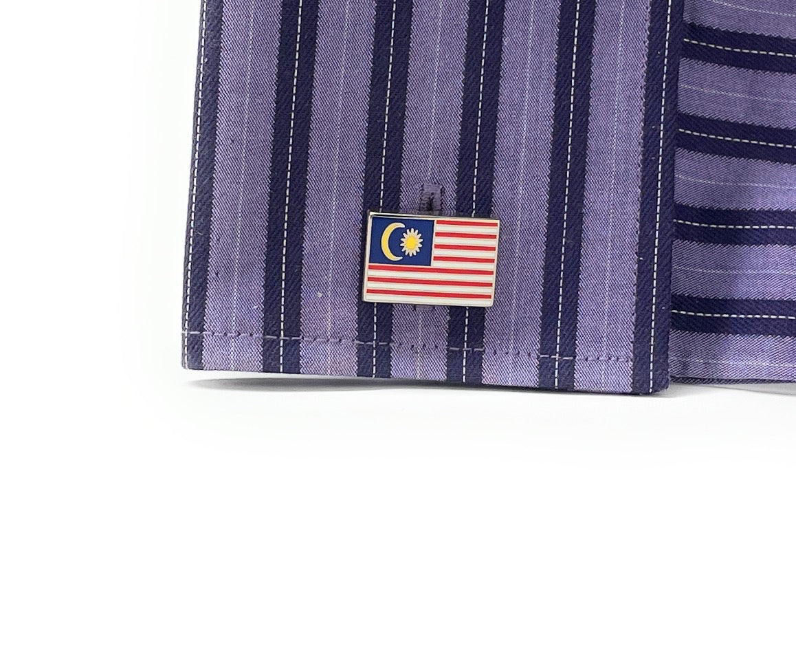 Malaysian flag patch on a striped shirt sleeve