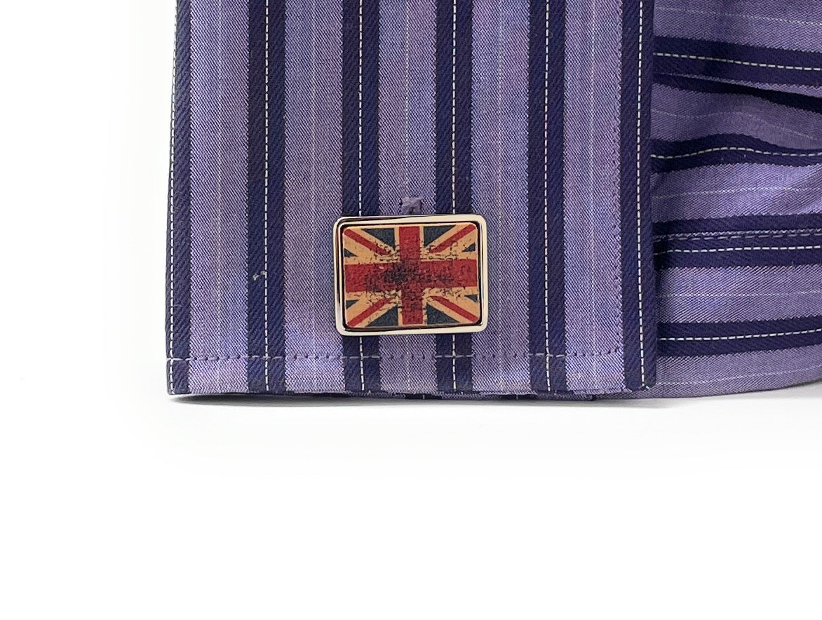 Purple striped shirt with a Union Jack cufflinks on a white background