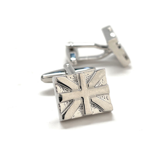 Polished silver Union Jack cufflinks with embossed British flag design and bullet-back closures, perfect for formal wear or patriotic gifts.