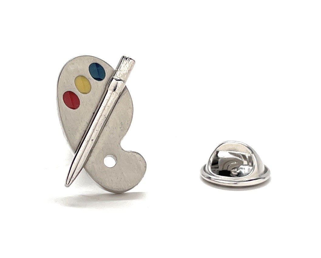 Silver artist paint palette lapel pin with colorful enamel paint and butterfly clutch backing.