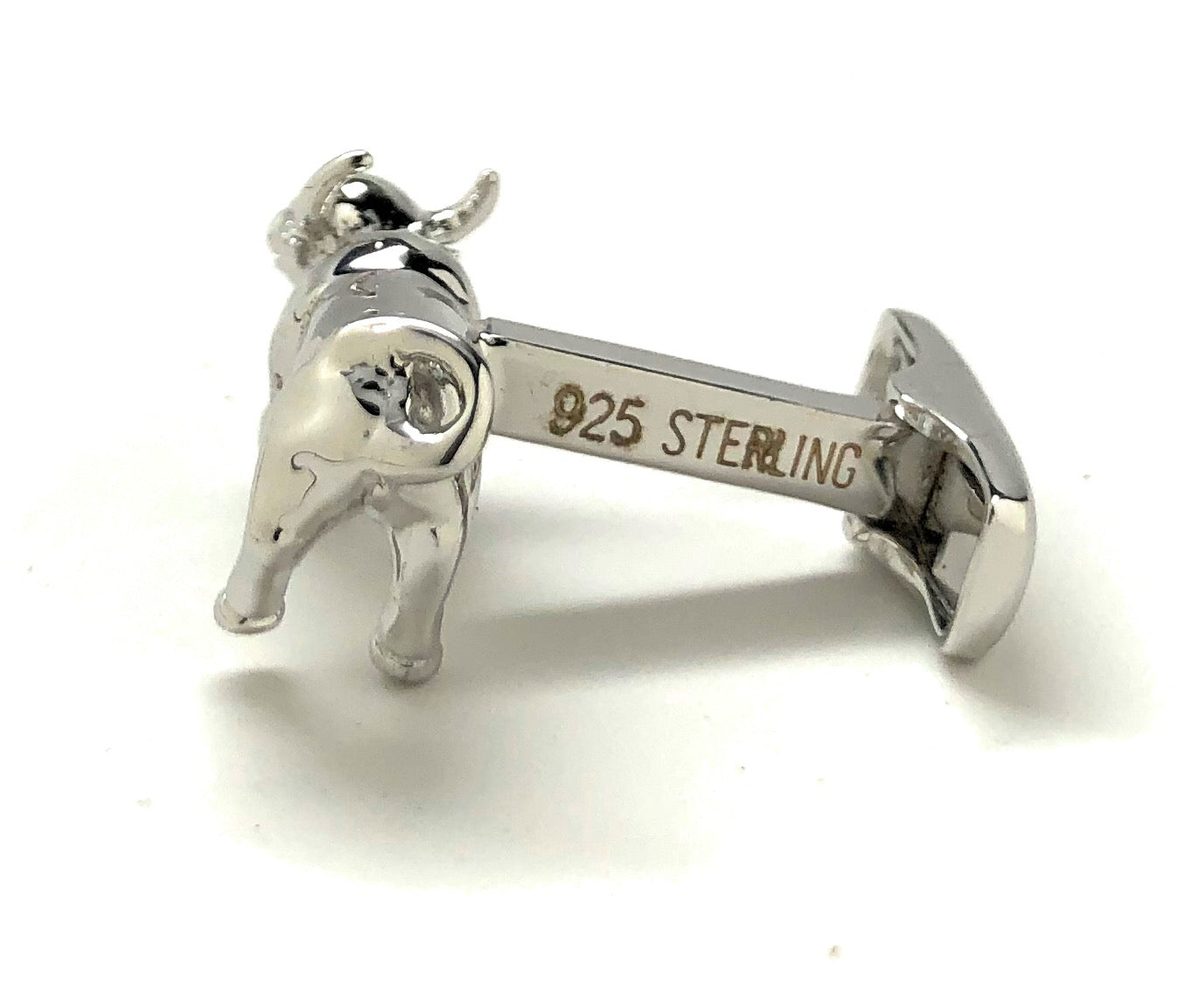 Silver bull-shaped cufflinks with '925 Sterling' marking on a white background