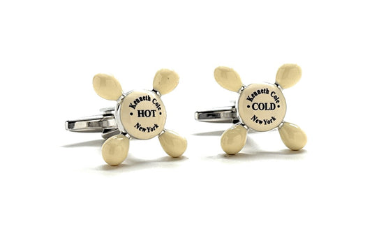 Pair of cufflinks with 'HOT' and 'COLD' labels on a white background