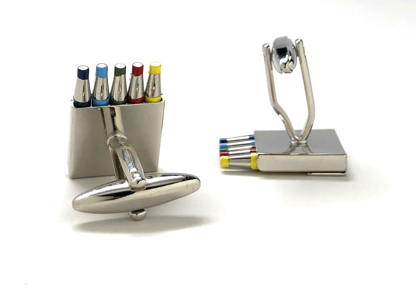 Metallic cufflinks with colorful accents on a white background