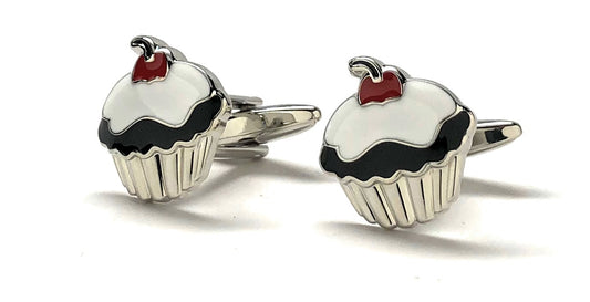Cupcake-shaped cufflinks with red berries on a white background