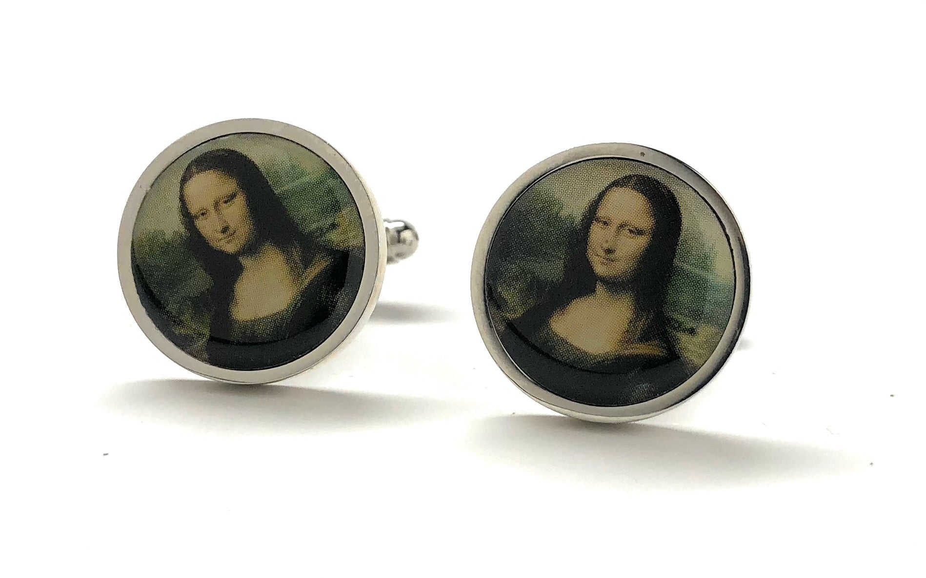 Mona Lisa cufflinks on a white background