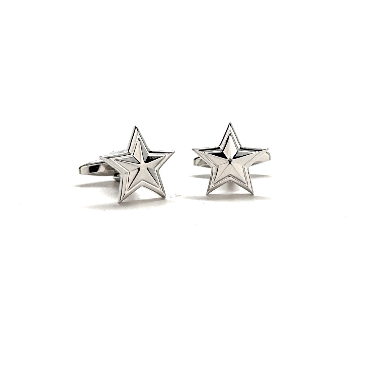 Star-shaped silver cufflinks on a white background
