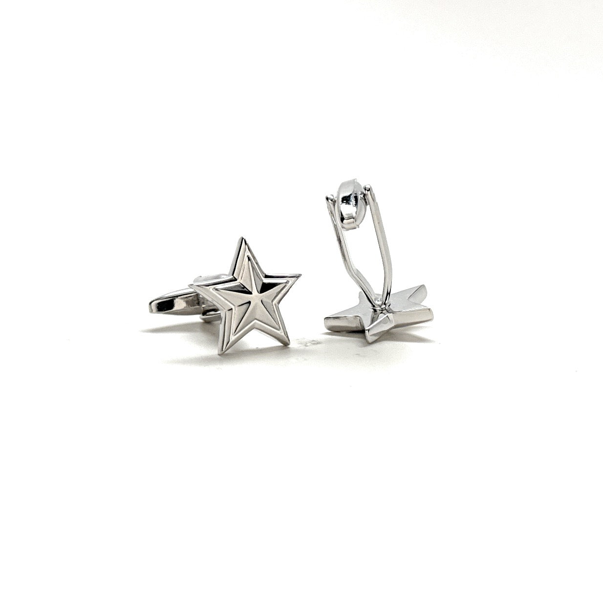Star-shaped silver cufflinks on a white background