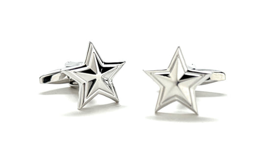 Pair of silver star-shaped cufflinks on a white background