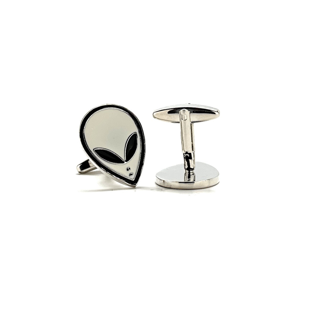 Alien head cufflinks on a white background