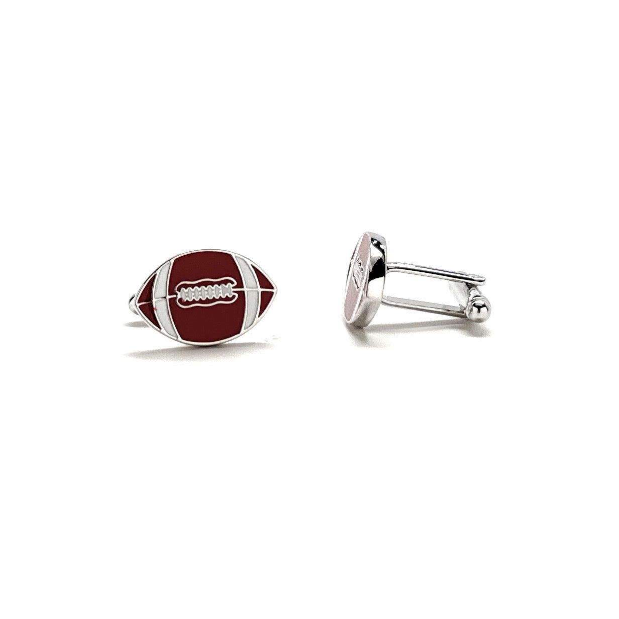 Football-shaped cufflinks on a white background