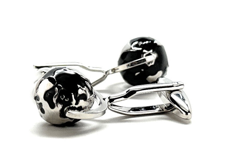 Silver and black spinning globe cufflinks with 3D rotating world design.