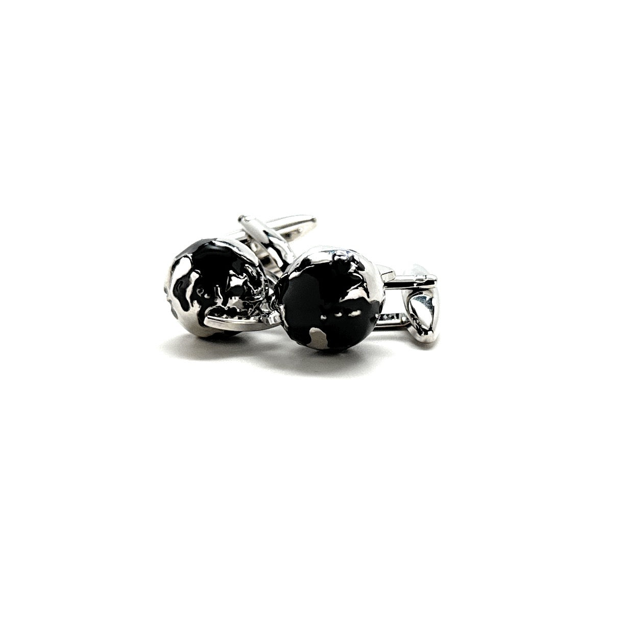 Silver and black spinning globe cufflinks with 3D rotating world design.