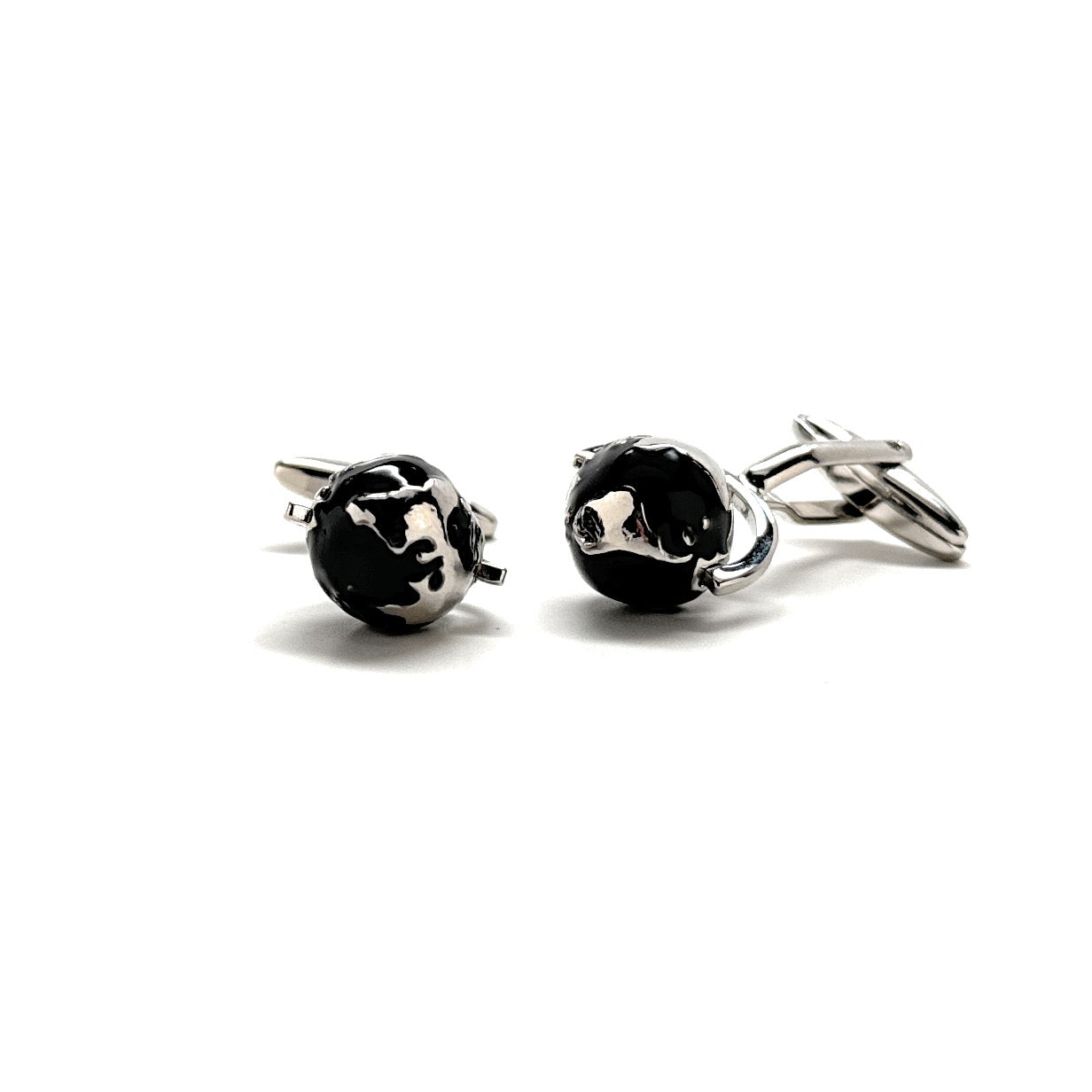 Silver and black spinning globe cufflinks with 3D rotating world design.