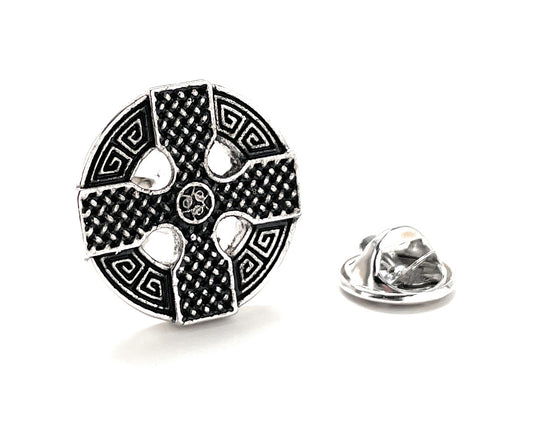 Black and silver decorative lapel pin on a white background