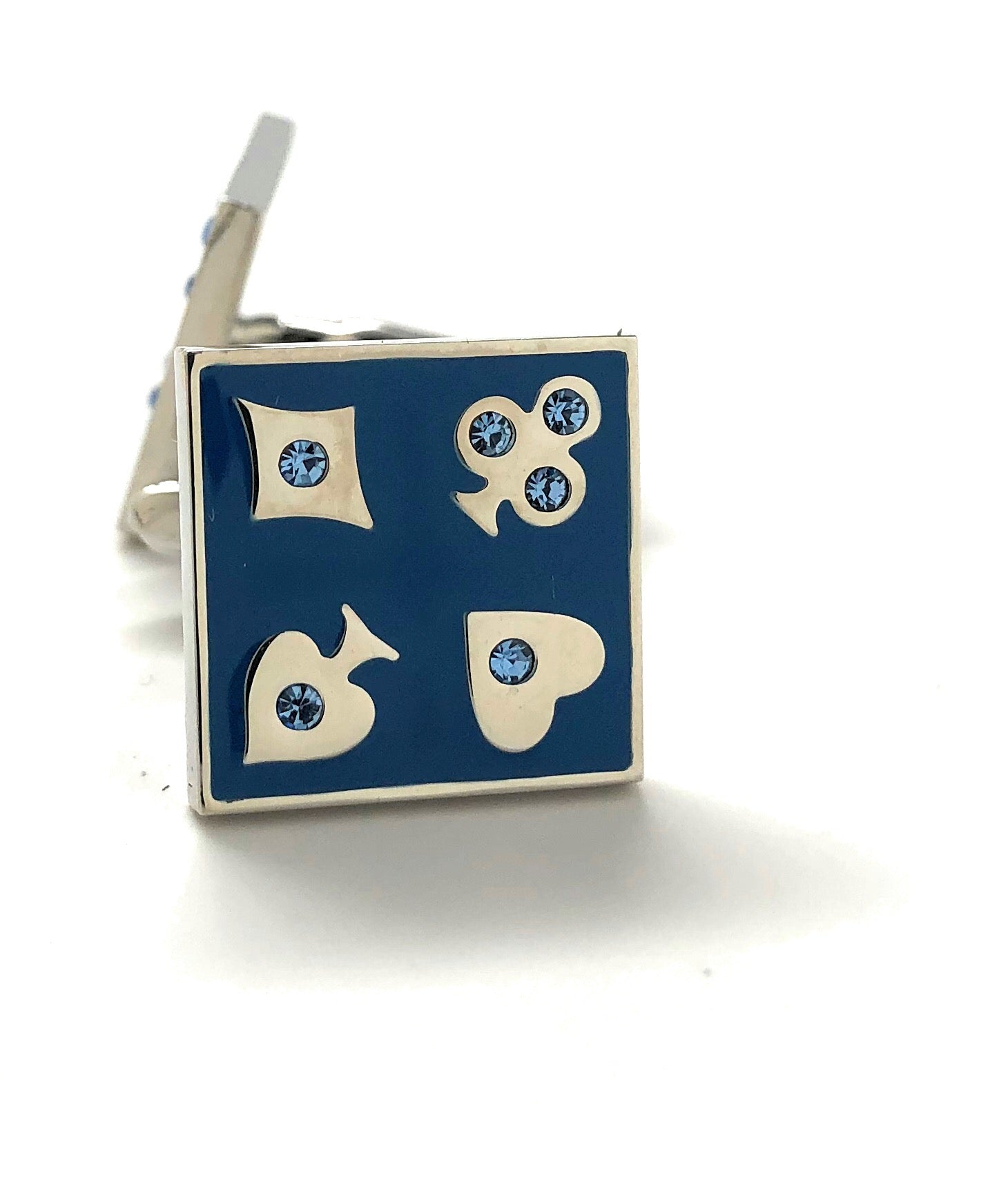 Cufflinks with blue gemstones on a white background
