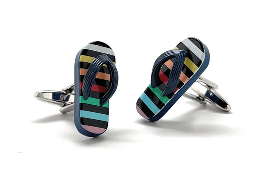Colorful striped flip-flop cufflinks on a white background
