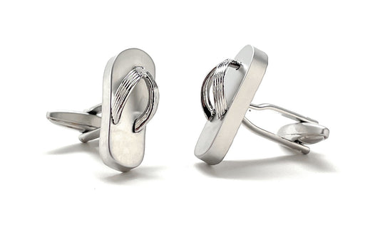 Silver flip-flop cufflinks on a white background