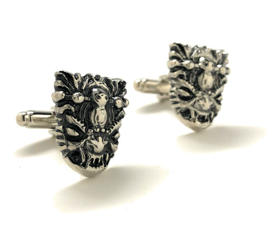 Silver yeti head cufflinks on a white background