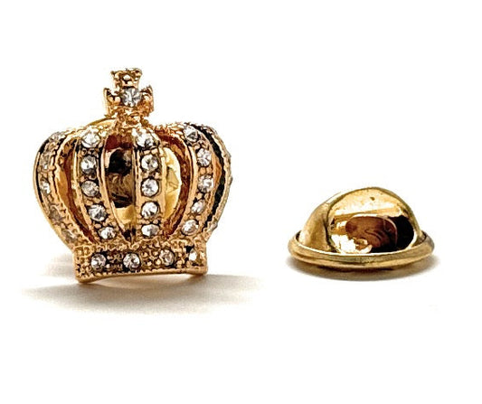 Gold crown-shaped lapel pin on a white background