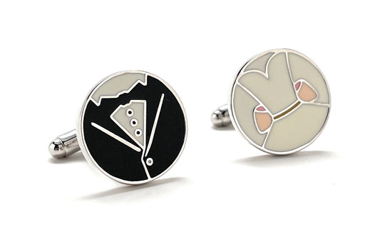 Two round cufflinks with black and white design on one and beige and pink design on the other, on a white background.