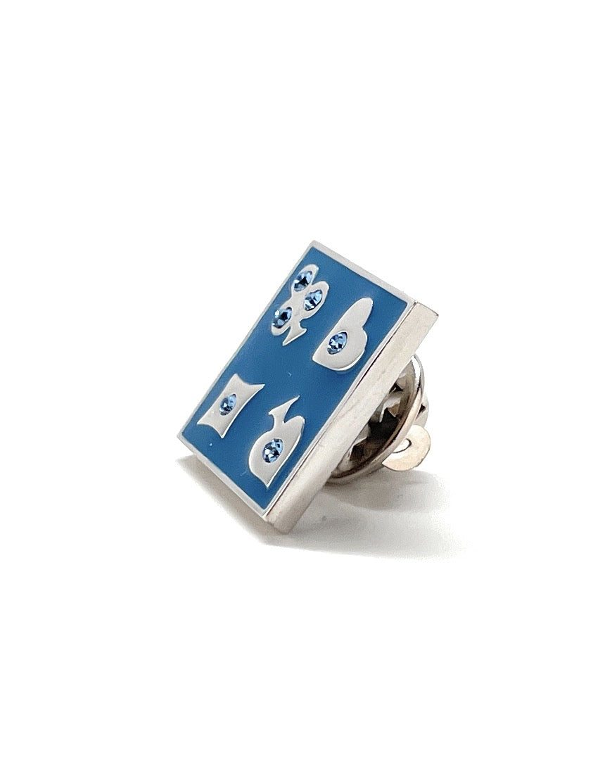 Tie clip with blue and white design on a white background