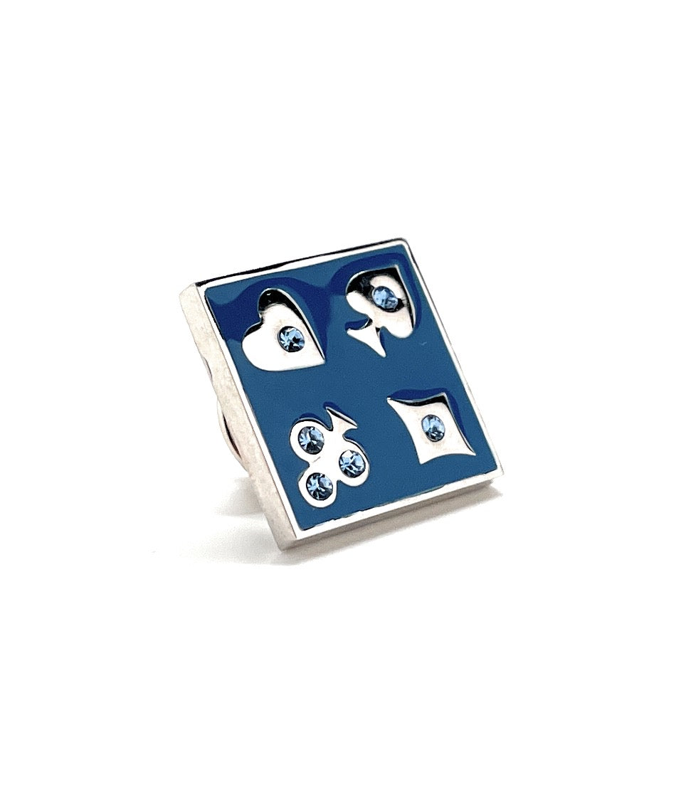Blue and silver card suit lapel pin on a white background