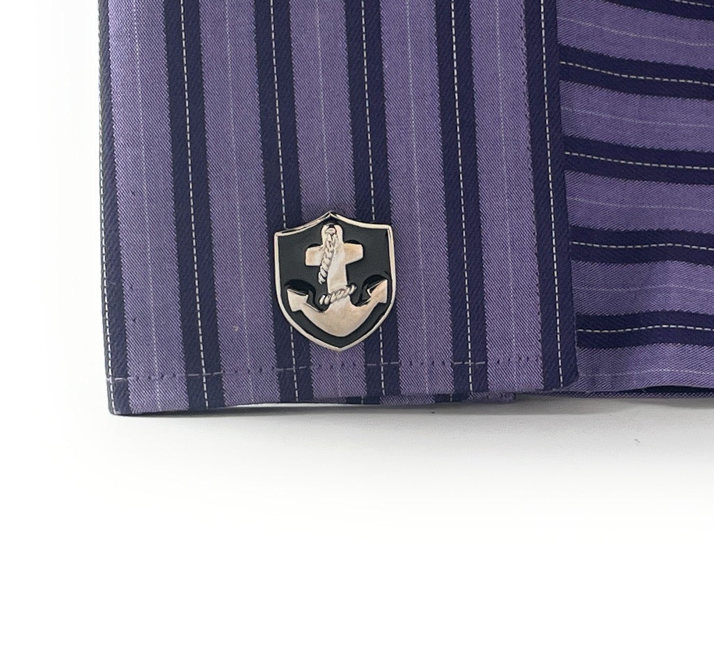 Purple striped shirt with a logo on a white background
