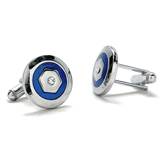Silver cufflinks with blue and black accents on a white background