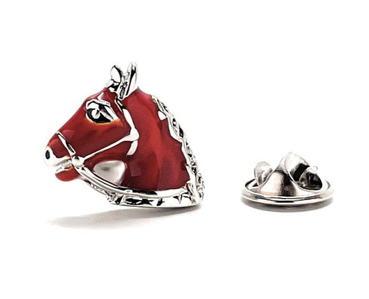 Red horse head lapel pin with silver detailing on a white background