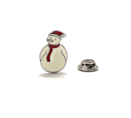 Snowman-shaped lapel pin with a red scarf and hat on a white background
