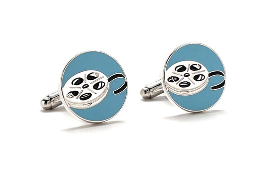 Cufflinks with film reel design on a light blue background